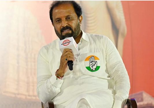 Action is required on the official who contributed to the poem in Singareni